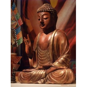 Bouddha statue meditating, hand sign of benediction
